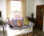 greyton accommodation self catering lounge with fireplace